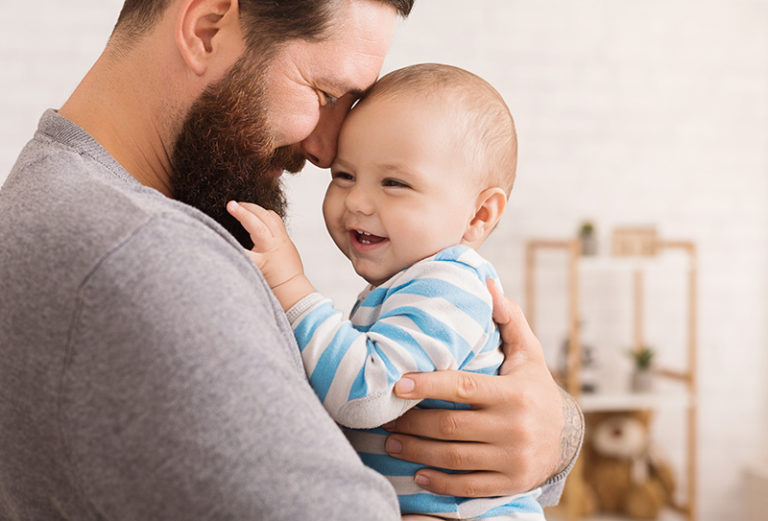 Loving father embracing his baby son - Perspectives